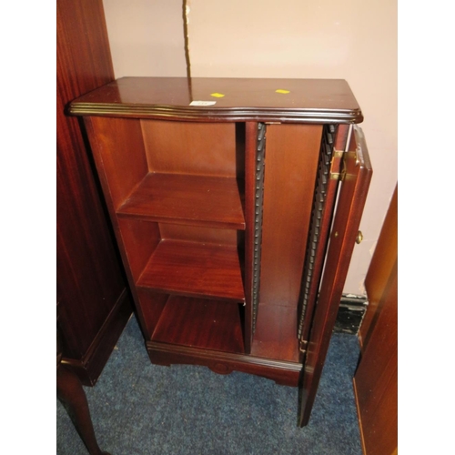 714 - A REPRODUCTION MAHOGANY CABINET AND NEST OF TABLES