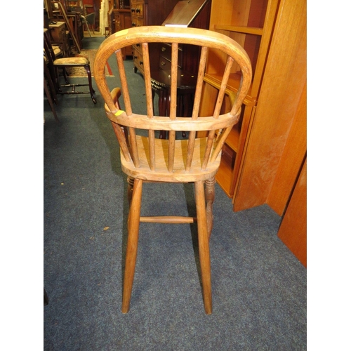 718 - A SMALL ANTIQUE CHILDS WINDSOR HIGH CHAIR