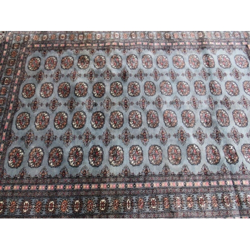 730 - A VINTAGE WOOLLEN RUG - 240 x 156 cm