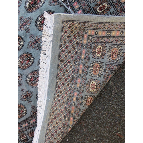 730 - A VINTAGE WOOLLEN RUG - 240 x 156 cm