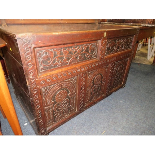 744 - AN ANTIQUE OAK CARVED COFFER - W 13 cm