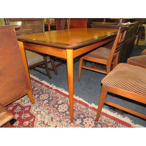 745 - A MID-CENTURY EXTENDING GIMSON & SLATER LTD VESPER DINING TABLE & FOUR CHAIRS