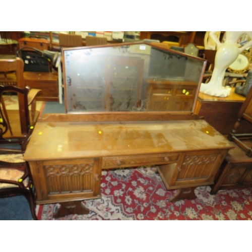 750 - AN OAK GOTHIC DRESSING TABLE