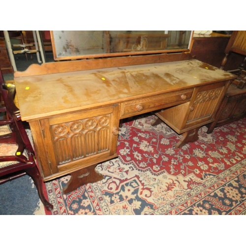 750 - AN OAK GOTHIC DRESSING TABLE