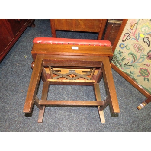 755 - A VINTAGE MAHOGANY PIANO STOOL AND AN OAK FIRESCREEN (2)