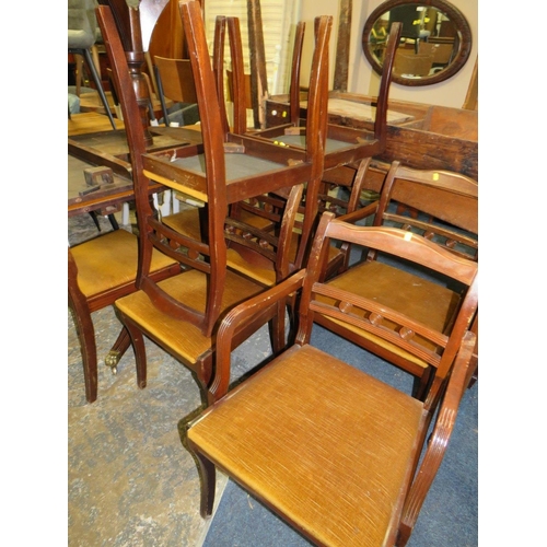 765 - A REPRODUCTION MAHOGANY SHAPED SIDEBOARD WITH A TWIN PEDESTAL TABLE AND EIGHT CHAIRS