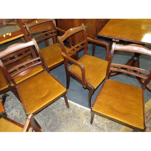 765 - A REPRODUCTION MAHOGANY SHAPED SIDEBOARD WITH A TWIN PEDESTAL TABLE AND EIGHT CHAIRS