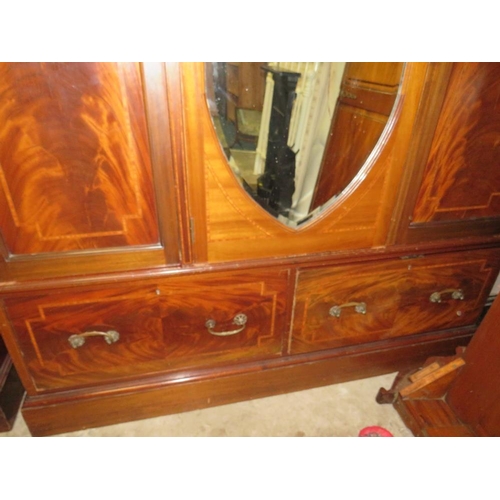 770 - AN ANTIQUE MAHOGANY INLAID TRIPLE WARDROBE WITH CENTRAL MIRROR DOOR