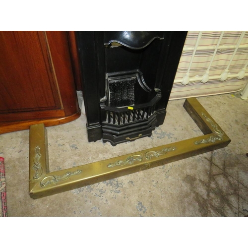 772 - A SMALL ORIGINAL CAST FIREPLACE WITH BRASS FENDER