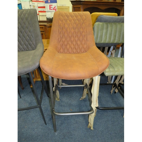 779 - A HARLEQUIN PAIR OF UPHOLSTERED BAR/KITCHEN STOOLS