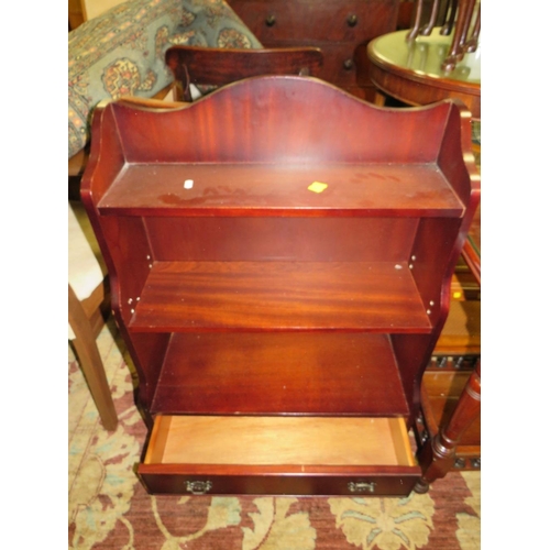 782 - AN ANTIQUE MAHOGANY CONSOLE TABLE AND A REPRODUCTION BOOKCASE