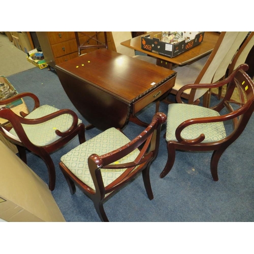 783 - A REPRODUCTION MAHOGANY DROPLEAF TABLE AND FOUR CHAIRS