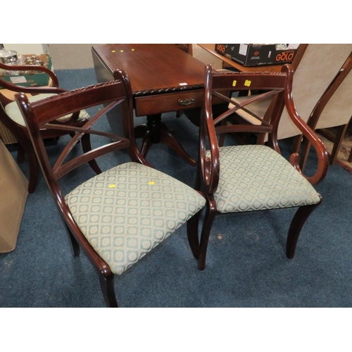 783 - A REPRODUCTION MAHOGANY DROPLEAF TABLE AND FOUR CHAIRS