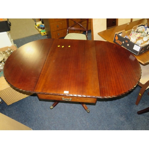 783 - A REPRODUCTION MAHOGANY DROPLEAF TABLE AND FOUR CHAIRS