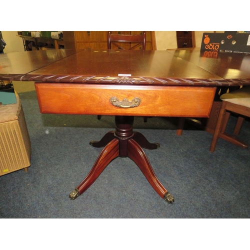 783 - A REPRODUCTION MAHOGANY DROPLEAF TABLE AND FOUR CHAIRS