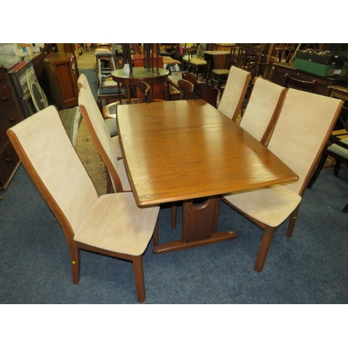 785 - A MODERN ERCOL DRAWLEAF DINING TABLE AND 6 CHAIRS