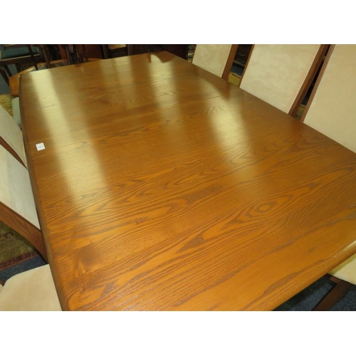 785 - A MODERN ERCOL DRAWLEAF DINING TABLE AND 6 CHAIRS