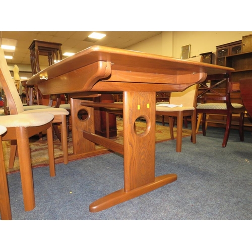 785 - A MODERN ERCOL DRAWLEAF DINING TABLE AND 6 CHAIRS