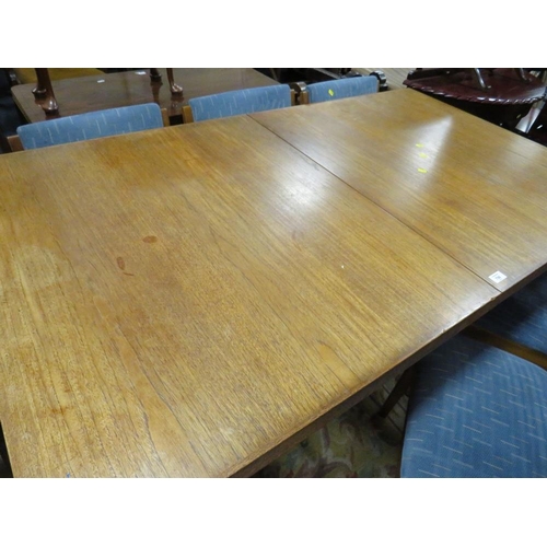 796 - A MID-CENTURY TEAK EXTENDING DINING TABLE AND 6 CHAIRS