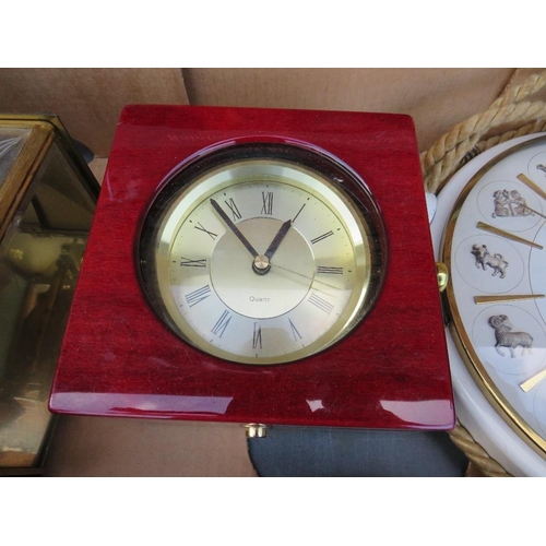 87 - A TRAY CONTAINING A KIENZLE ZODIAC WALL CLOCK, QUARTZ NAUTICAL CLOCK, MANTLE CLOCK AND A SHATZ BRACK... 