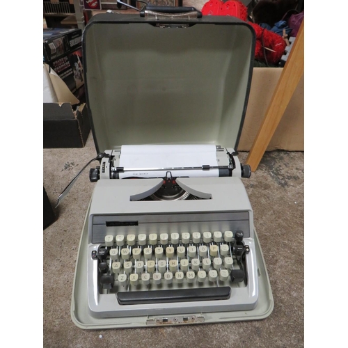 89 - A VINTAGE ADLER GABRIELLE TYPEWRITER IN CASE