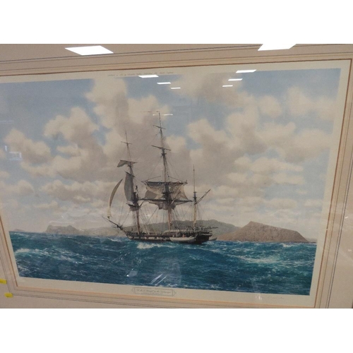 21 - A GILT FRAMED AND GLAZED SIGNED PRINT OF HMS BEAGLE IN THE GALAPAGOS - JOHN CHANCELLOR