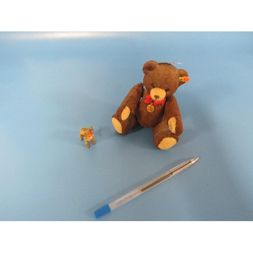 265 - A JOINTED PORCELAIN MINIATURE STEIFF TEDDY BEAR LICENSE EC99 # 53813  TOGETHER WITH A STEIFF MINIATU... 