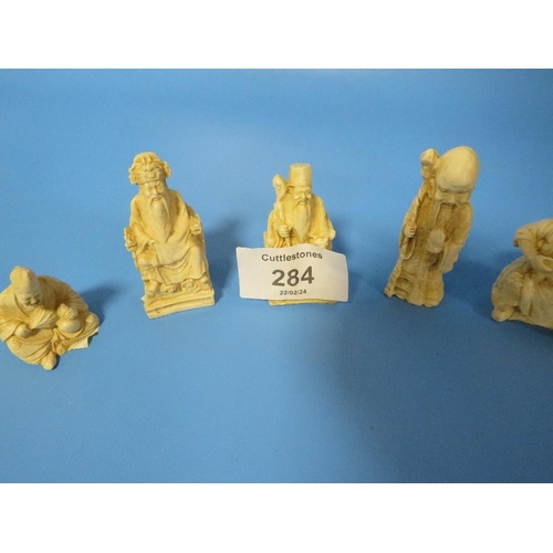 284 - FIVE CHINESE TYPE SMALL CARVED BONE FIGURES