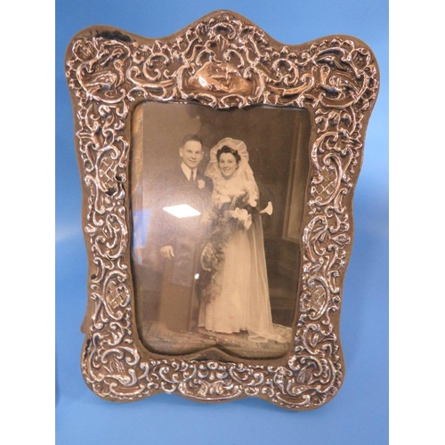 285 - TWO ANTIQUE HALLMARKED SILVER PHOTO FRAMES A/F