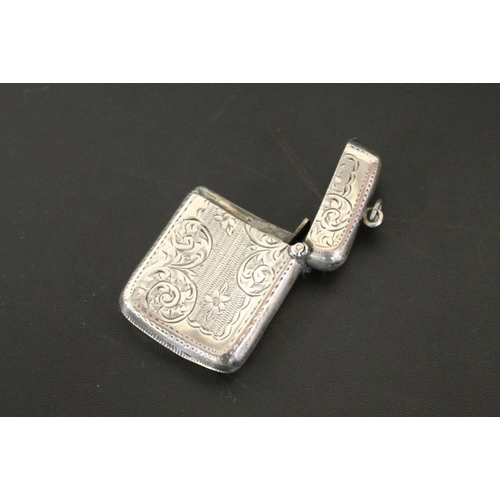 324 - A HALLMARKED SILVER VESTA