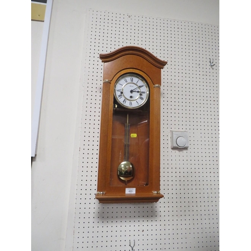 465 - A MODERN HERMLE PENDULUM WALL CLOCK WITH KEY