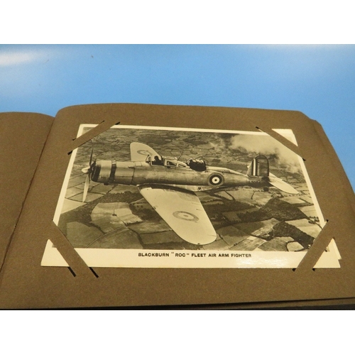 344 - A VINTAGE PHOTO GRAPHICAL POSTCARDS  ALBUM FILLED WITH MANY BLACK & WHITE IMAGES OF RAF FIGHTER PLAN... 