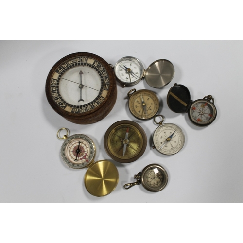 387 - A SMALL TRAY OF EIGHT VARIOUS VINTAGE COMPASSES