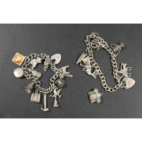 414 - TWO SILVER CHARM BRACELETS