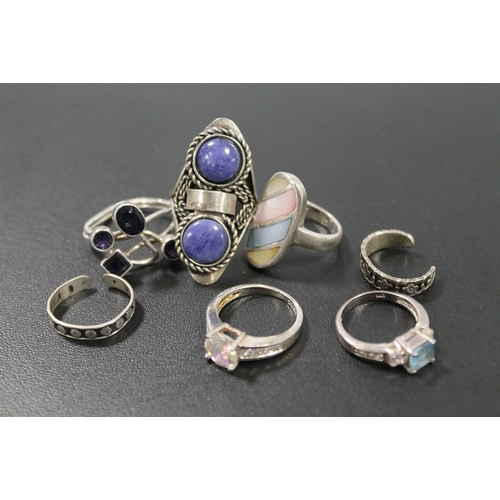 419 - A COLLECTION OF SILVER AND WHITE METAL DRESS RINGS