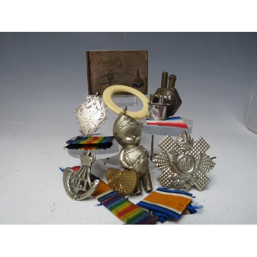 126 - A SMALL GROUP OF COLLECTABLES, to include an epns babies rattle & teething ring, trench art lighter,... 