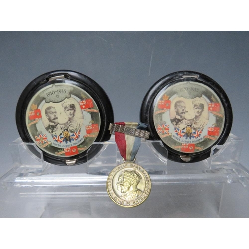 132 - TWO 1935 SILVER JUBILEE POWDER COMPACTS, Dia. 7.5 cm, one A/F, together with a Silver Jubilee medall... 