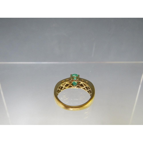 153 - AN 18CT GOLD 'ILIANA' EMERALD RING, with diamond set shoulders, the certificate states it is a Colum... 