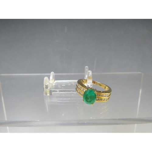 153 - AN 18CT GOLD 'ILIANA' EMERALD RING, with diamond set shoulders, the certificate states it is a Colum... 