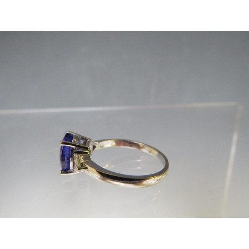 155 - AN 18CT WHITE GOLD 'ILIANA' SAPPHIRE RING, with diamond set shoulders, ring size O ½