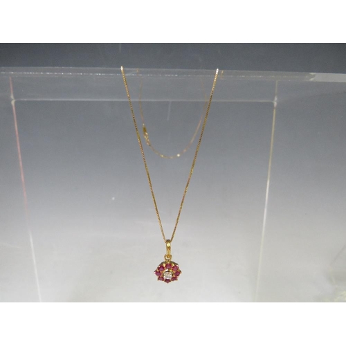 158 - AN 18CT GOLD 'ILIANA' RUBY AND DIAMOND PENDANT ON CHAIN