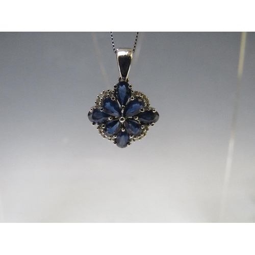 159 - AN 9CT WHITE GOLD 'ILIANA' SAPPHIRE AND DIAMOND PENDANT ON CHAIN