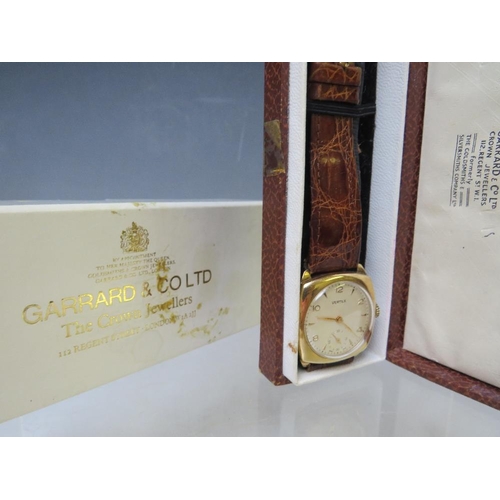 182 - A 9 CARAT GOLD VERTEX WRIST WATCH WITH PRESENTATION ENGRAVING TO REVERSE, circa 1958,  in Garrard & ... 