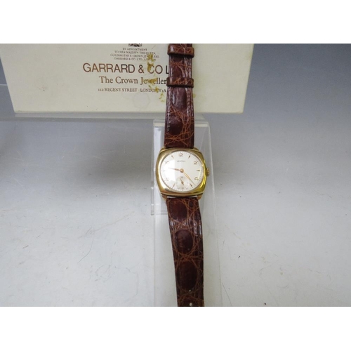 182 - A 9 CARAT GOLD VERTEX WRIST WATCH WITH PRESENTATION ENGRAVING TO REVERSE, circa 1958,  in Garrard & ... 