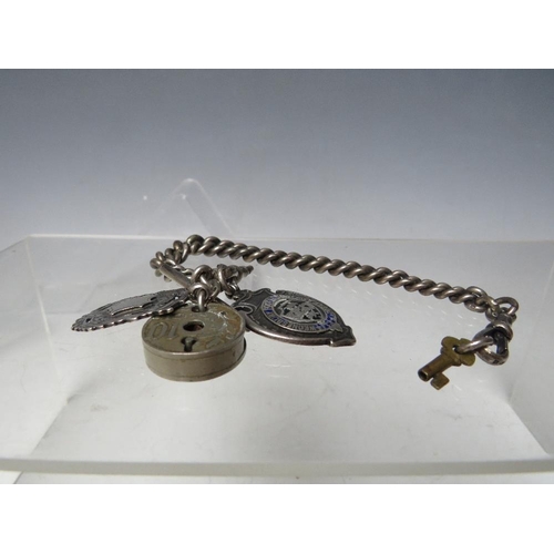 184 - A SILVER POCKET WATCH CHAIN, hallmarked to each link, with two fob medals and a small base metal pad... 