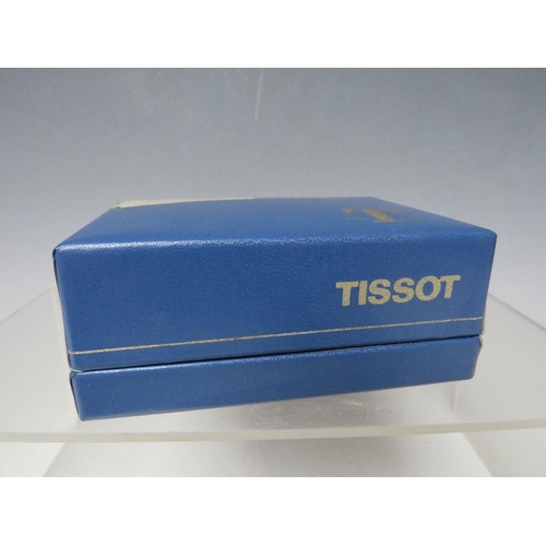 203 - A TISSOT 9CT GOLD CASED WRISTWATCH, on expanding yellow metal strap, together with original box and ... 