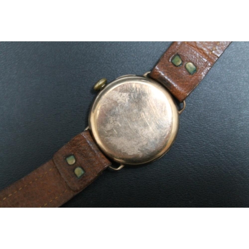 211 - A MORTH BROS LIVERPOOL 9CT  GOLD TRENCH WATCH WITH OMEGA MOVEMENT, in a Dennison case on leather str... 