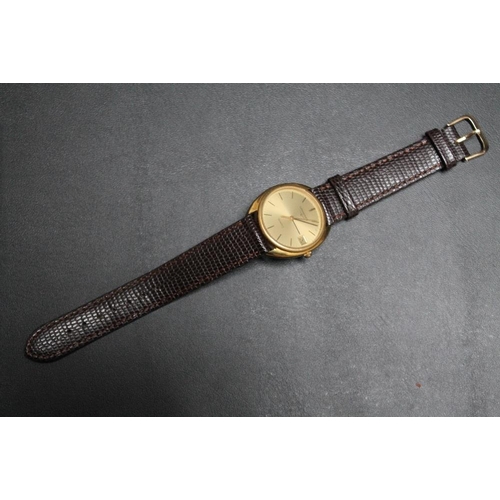 214 - LONGINES - A 1980'S GOLD PLATED QUARTZ DATE WRIST WATCH, on replacement leather strap, Dia 3.5 cmCon... 