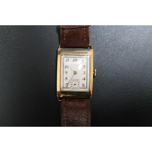 215 - A 1930'S STYLE ART DECO 9CT GOLD TANK TYPE 'CRUSADER' WRIST WATCH, on replacement leather strap, W 2... 