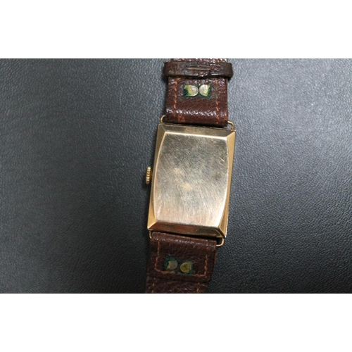 215 - A 1930'S STYLE ART DECO 9CT GOLD TANK TYPE 'CRUSADER' WRIST WATCH, on replacement leather strap, W 2... 